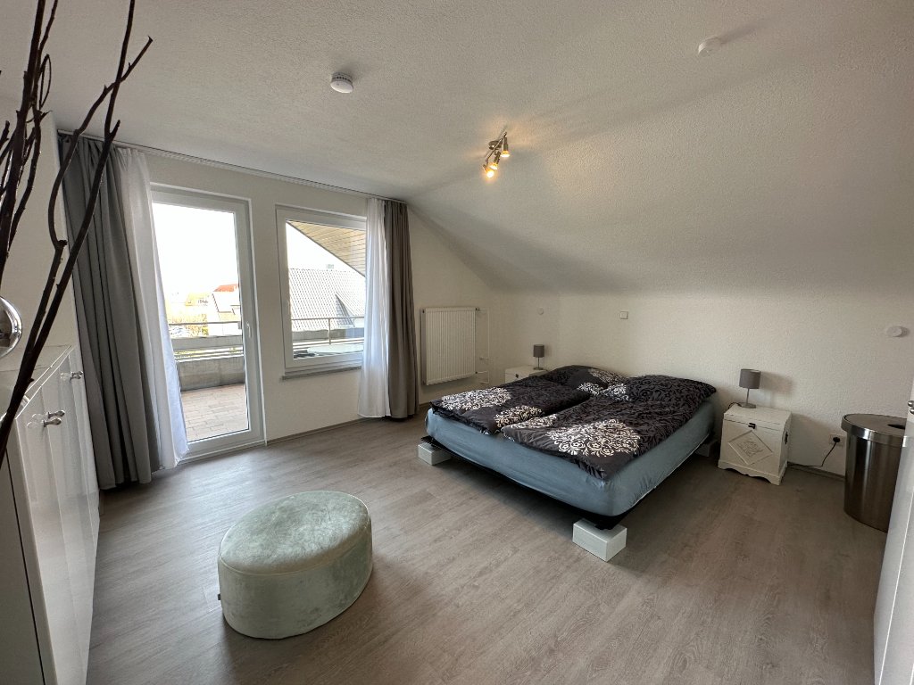 Schlafzimmer mit Balkon