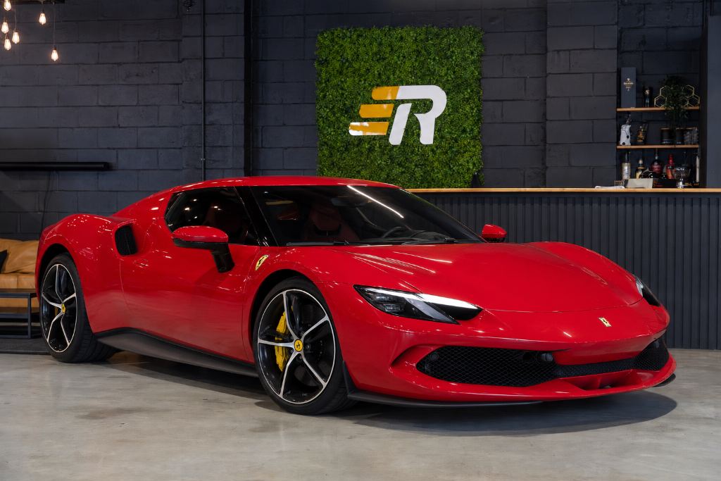 Red Ferrari prepared for consignment at Rennauto