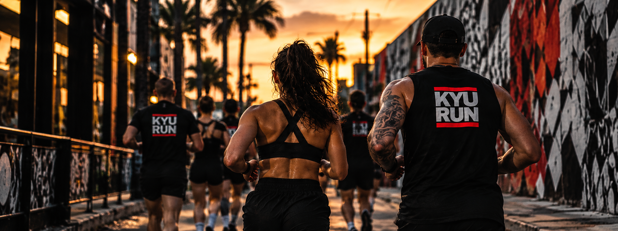 KYU Run — runners in KYU RUN gear at sunset in Wynwood