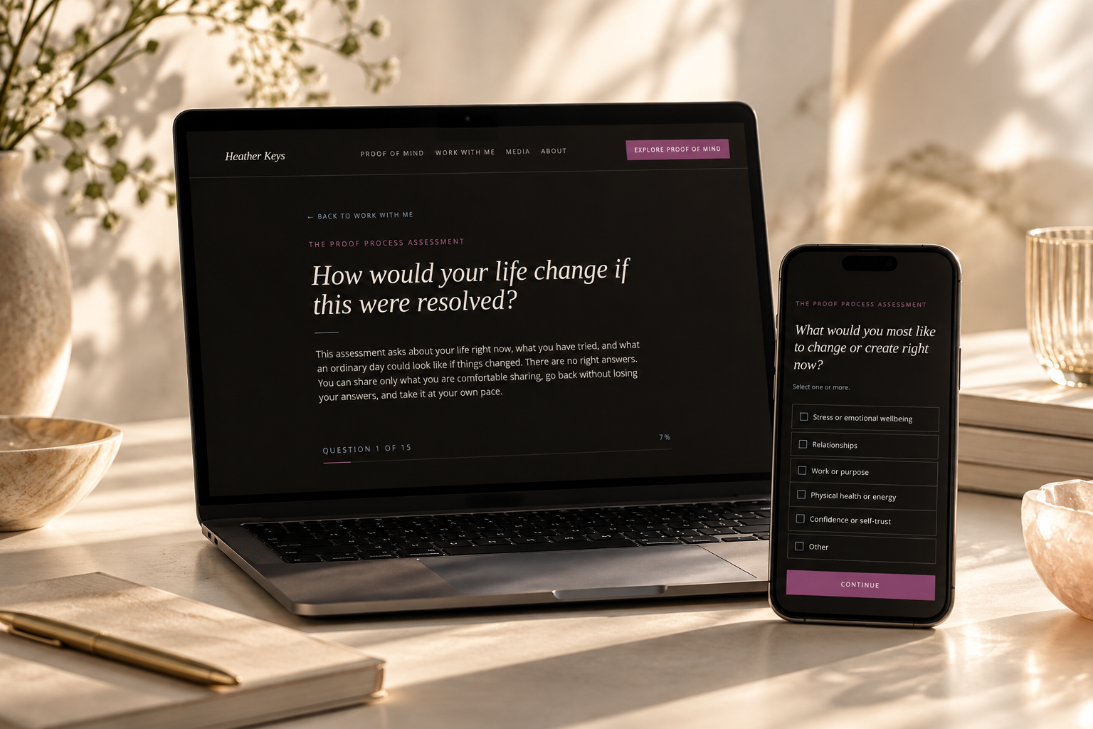 Laptop and phone displaying the Proof Process Assessment on a sunlit desk