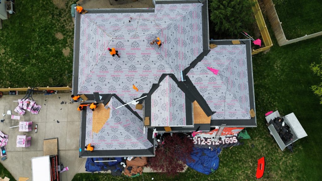Aerial view — underlayment installation in progress