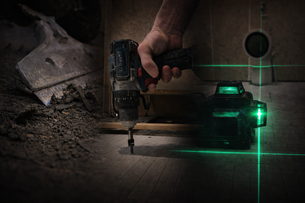 Laser level checking floor flatness before tiling