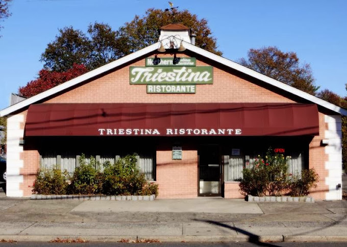 Triestina Ristorante ambiance with candlelit Italian dining