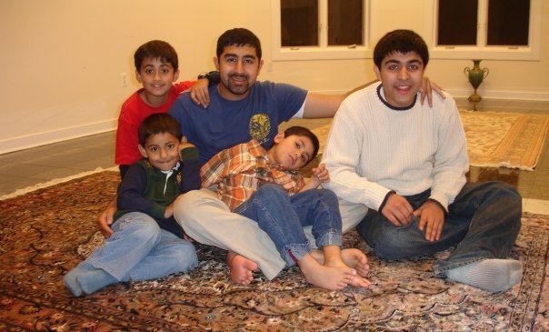 Hamza with his brother and their nephews. He has three nephews and four nieces in MCPS today