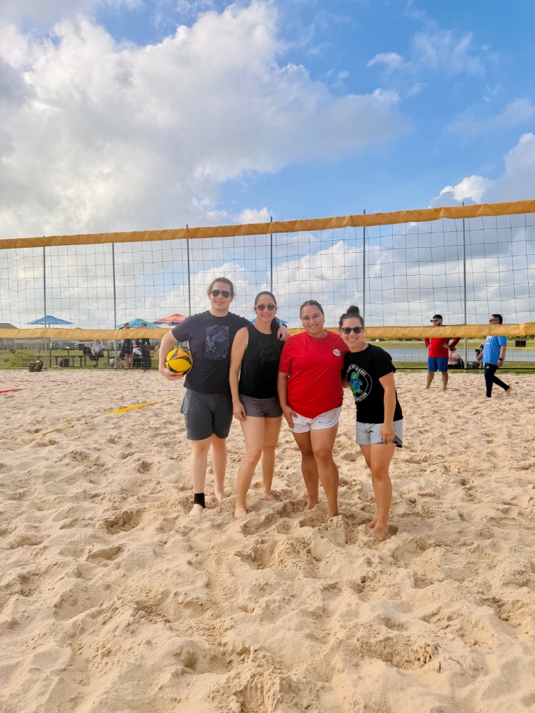 Team photo on sand court