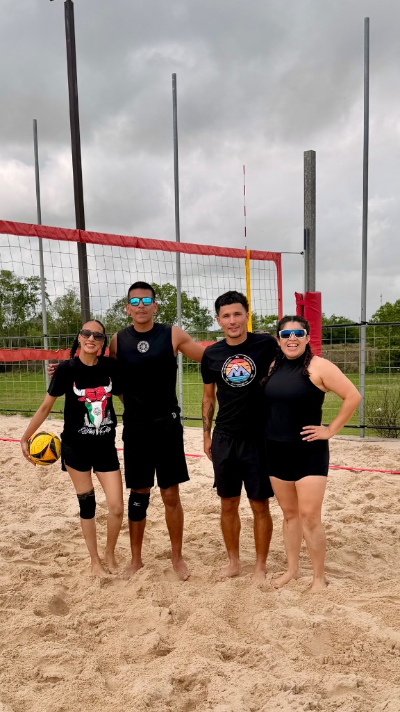 Team photo at the net