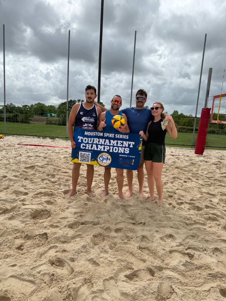 Team photo on sand court