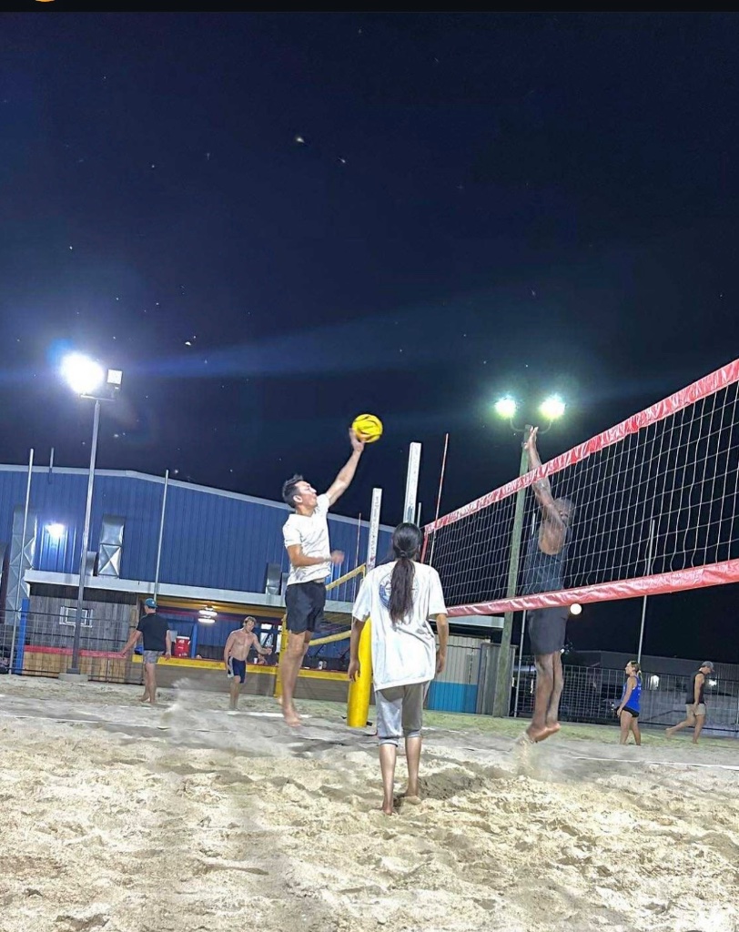 Night game spike at the net