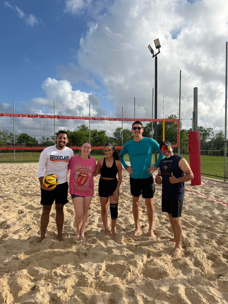 Team photo at the net