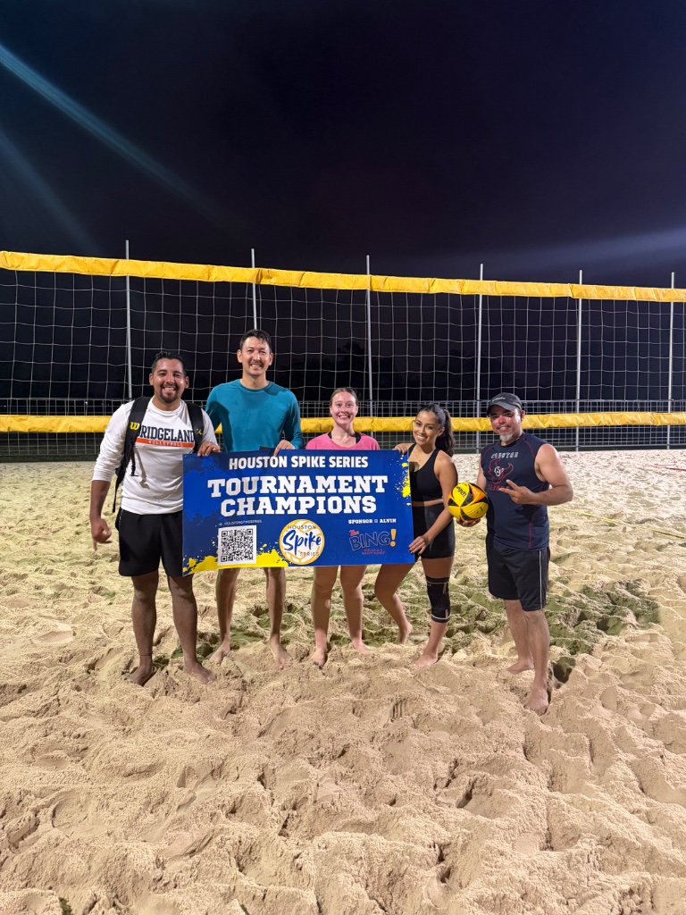 Team photo on sand court