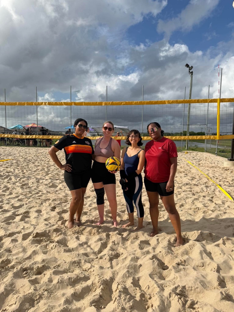 Team photo at the net