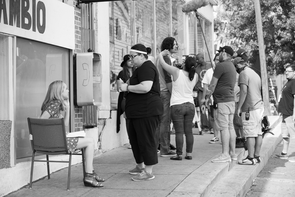 Boom Overhead at the Payphone