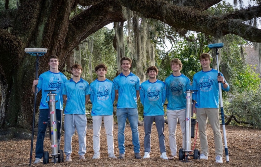 Soakd Window Cleaning team under Spanish moss oak trees in Charleston SC