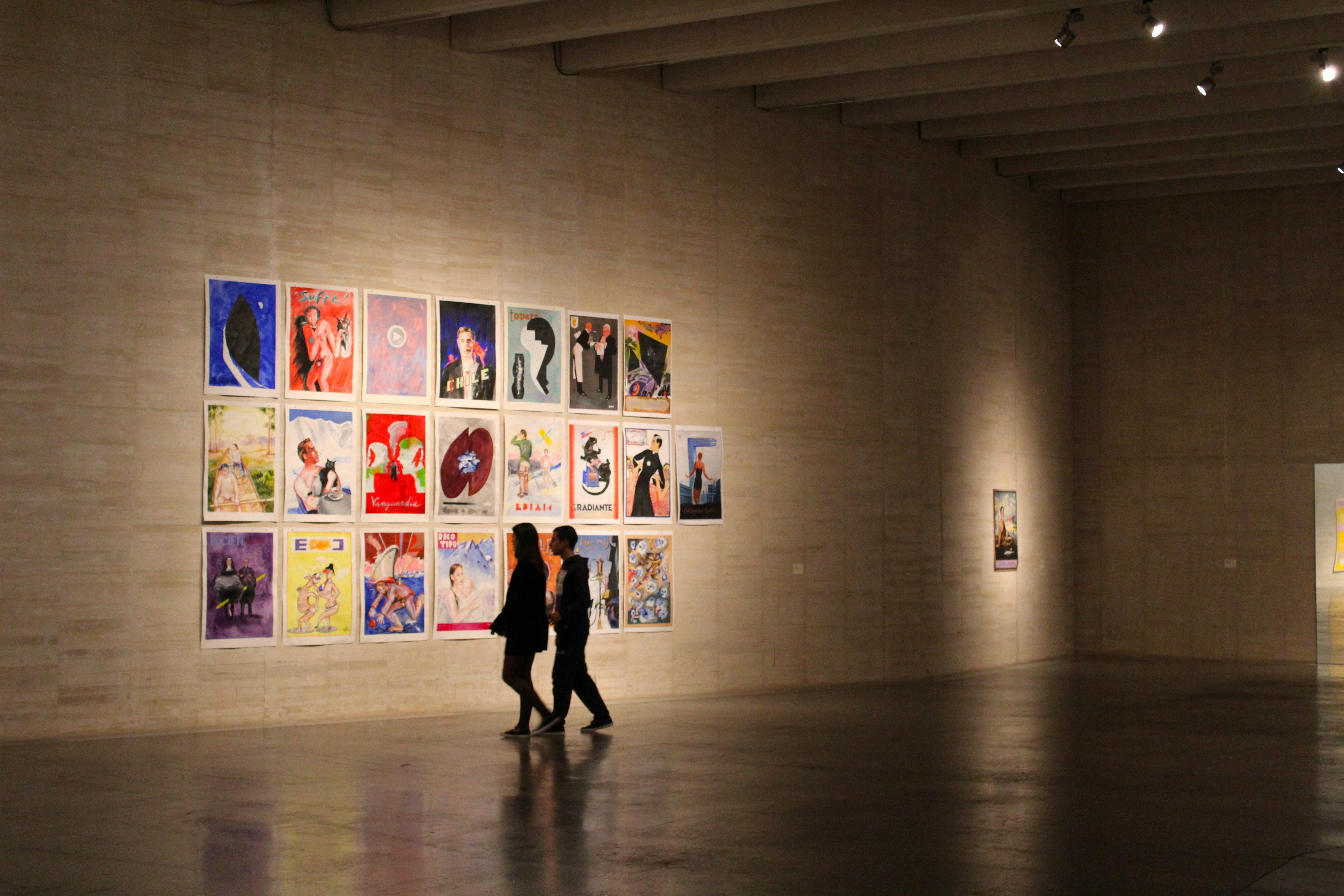 Collectors gathered around a single major painting at an auction preview.