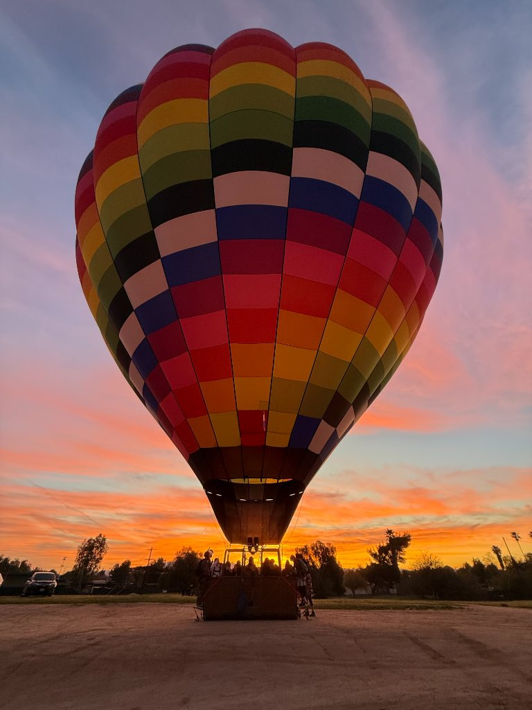Balloon at dramatic sunset