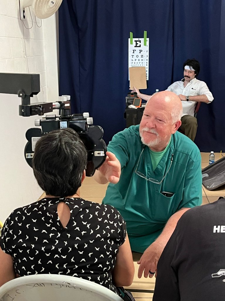 Doctor conducting eye exam