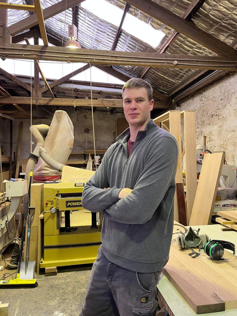 Craftsman working with timber