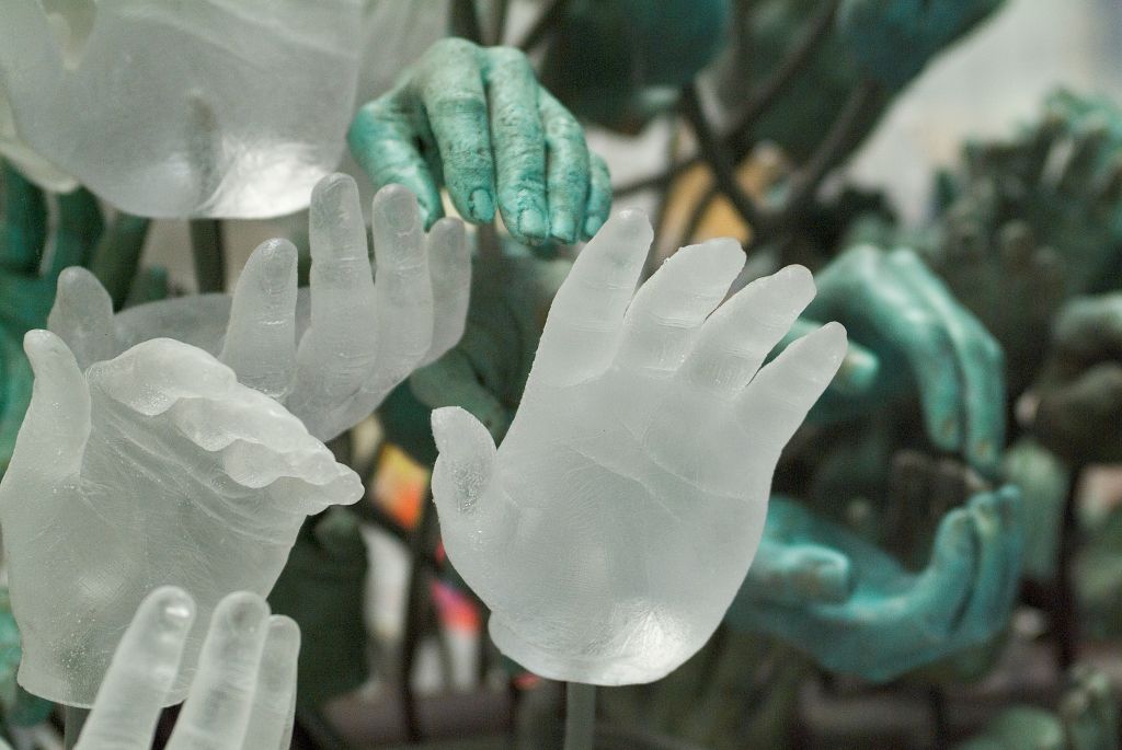 Standing Ovation — close-up detail of cast hands