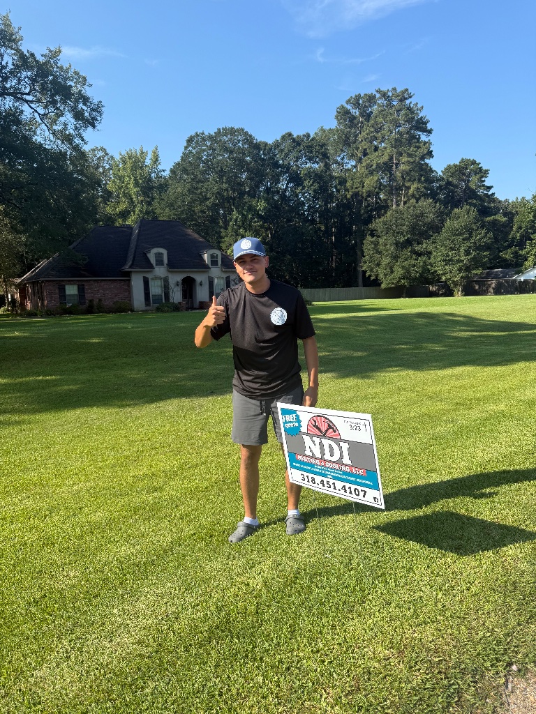 Noah with the NDI Sign