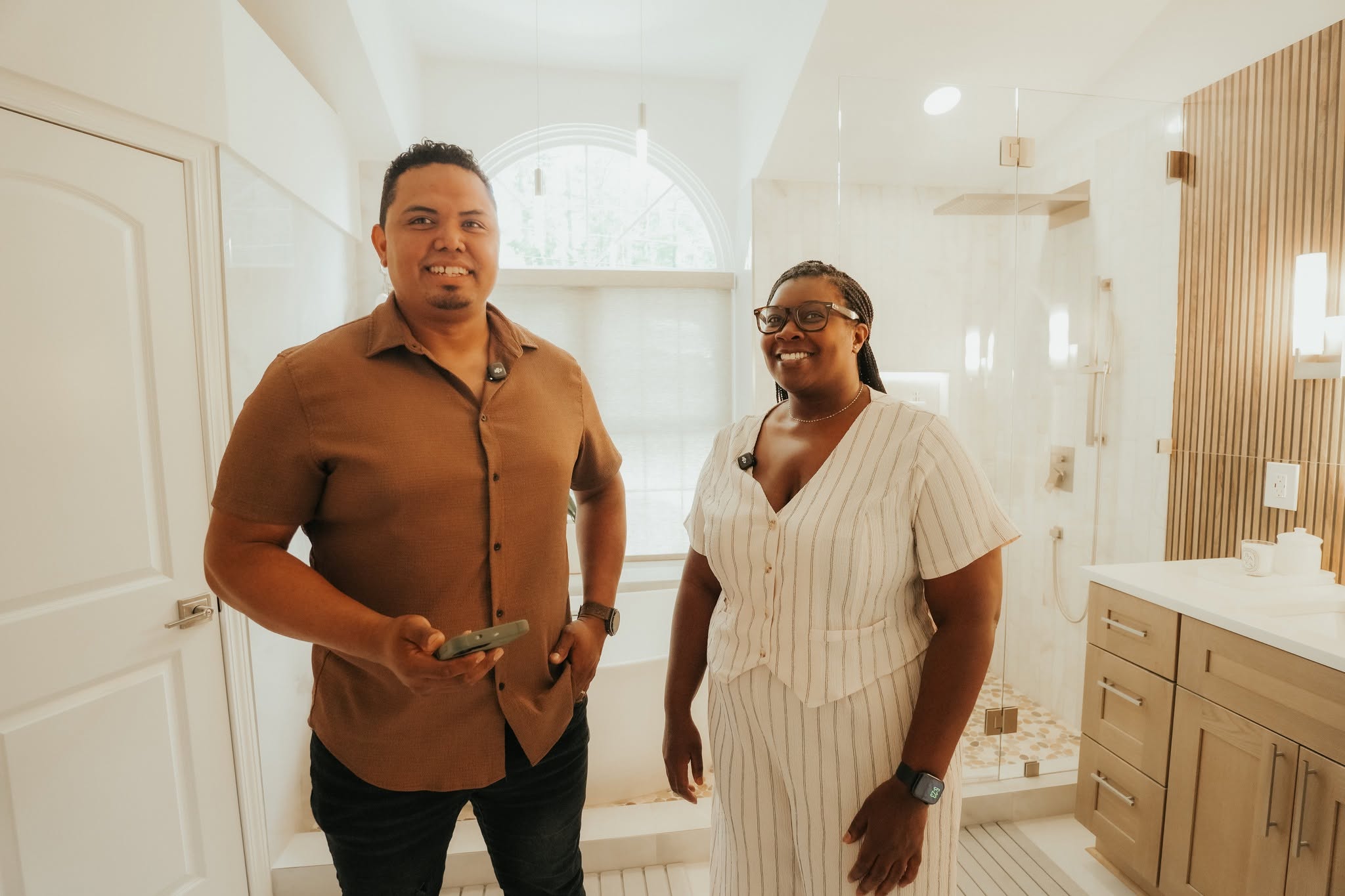 Happy clients in their newly renovated bathroom