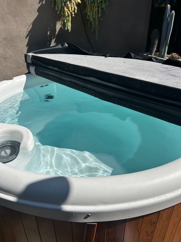 Installed hot tub in backyard