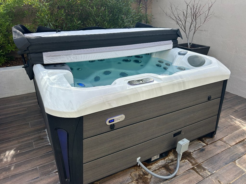 Hot tub with protective cover