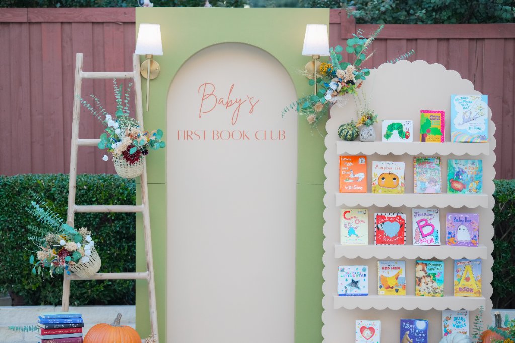 Colorful pool party balloon arch with pastel decor