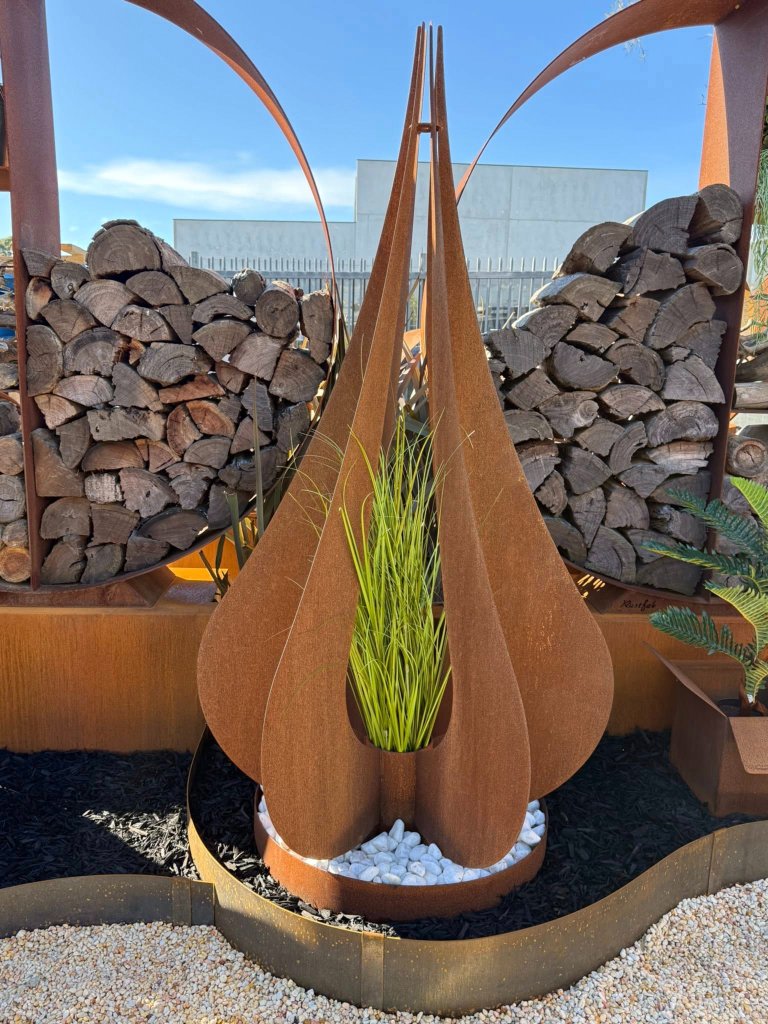 Rustfab teardrop planter sculpture