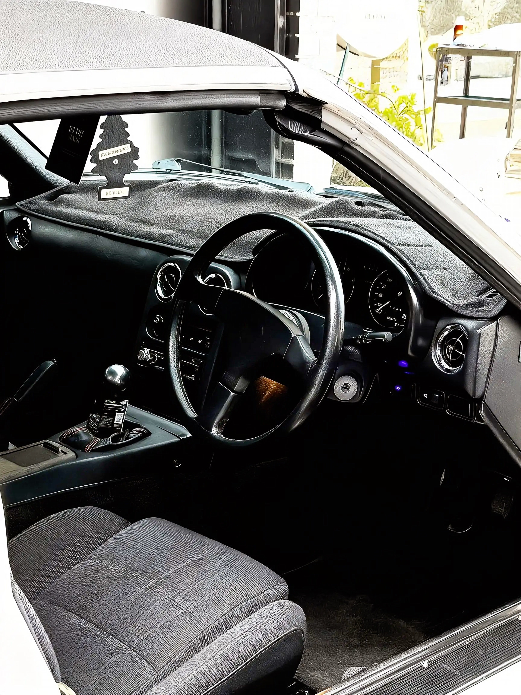 Fabric seat and interior trim being prepared before protection at Forza Auto Studio