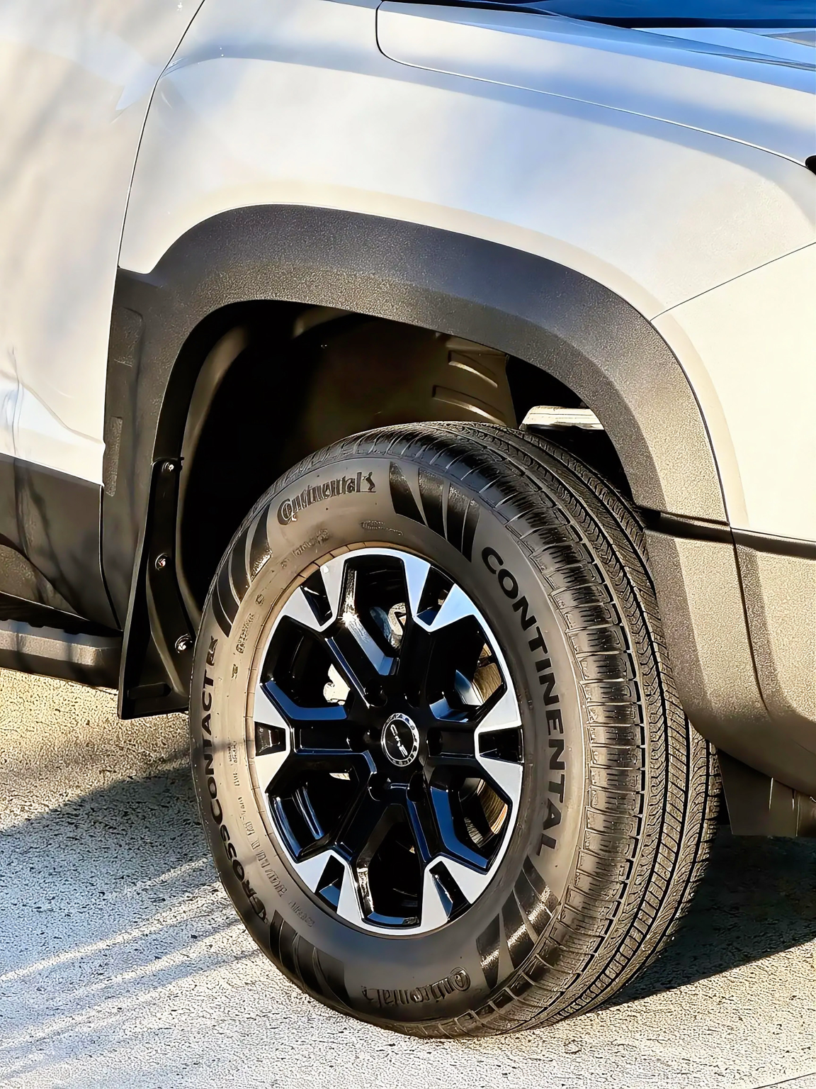 Continental CrossContact rubber over factory alloys, cleaned and dressed.