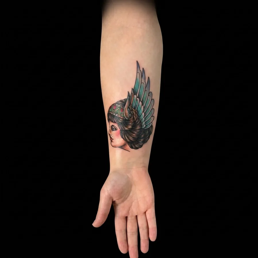 Valkyrie traditional flash shown tattooed on a forearm