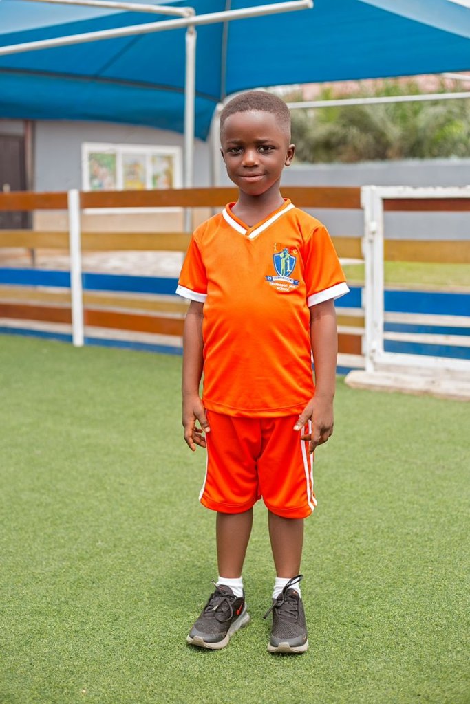 Children in PE uniforms outside