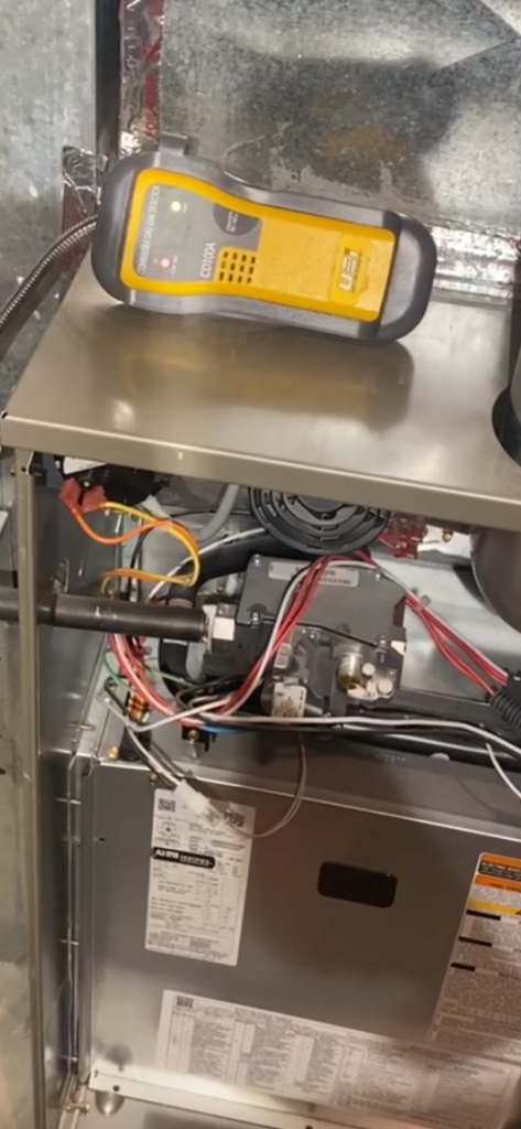 Furnace repair in progress — technician servicing gas furnace, Highlands Ranch Heating & Air