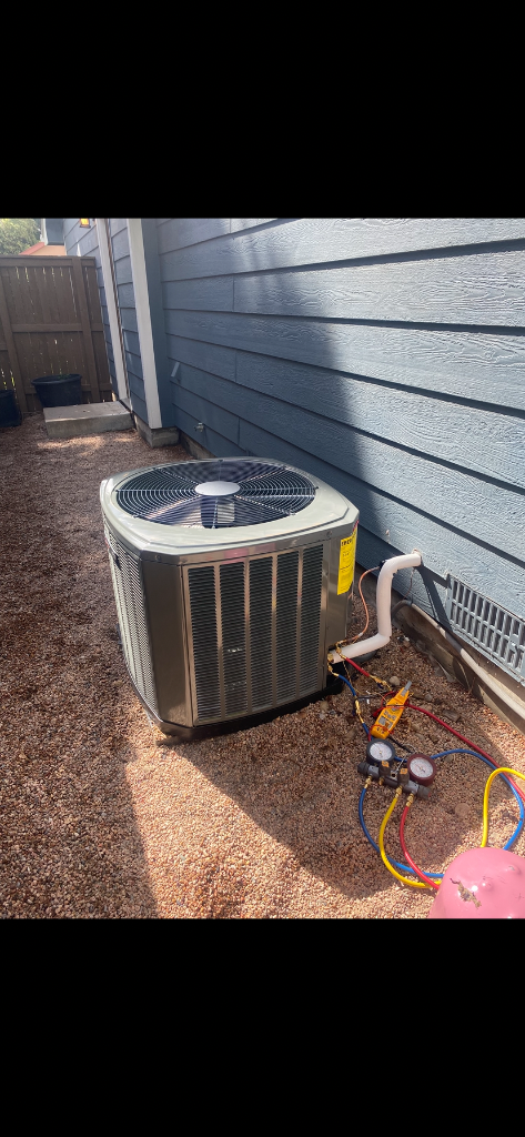AC repair in progress — outdoor condenser with refrigerant gauges, Highlands Ranch Heating & Air