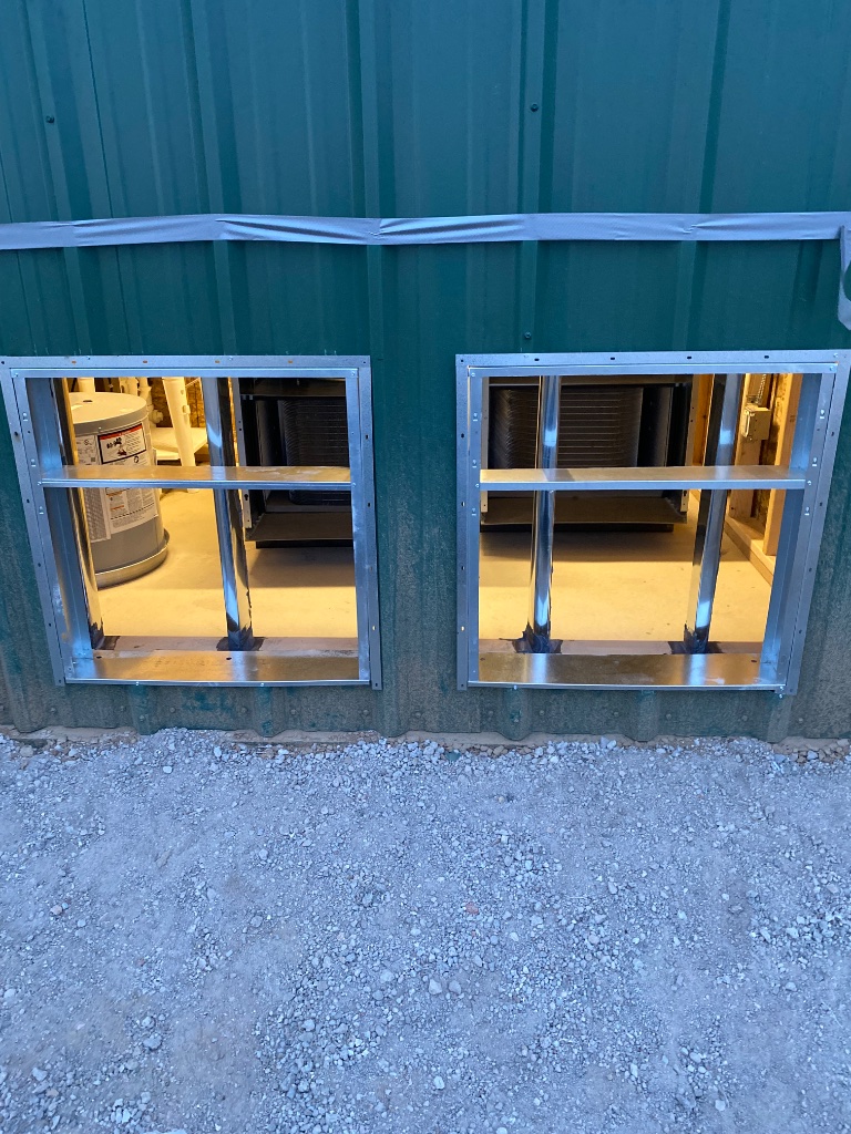 HVAC technician at work in Colorado home