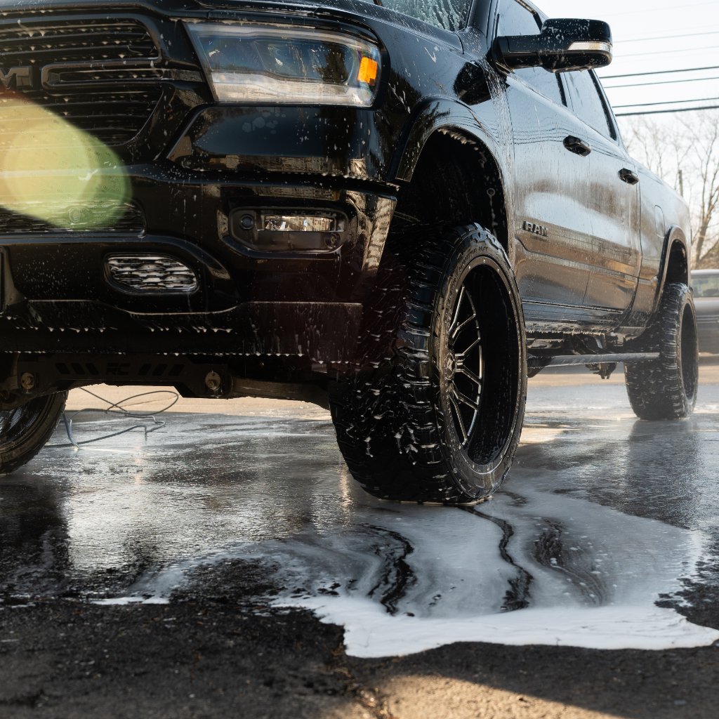 Rinsing black RAM truck