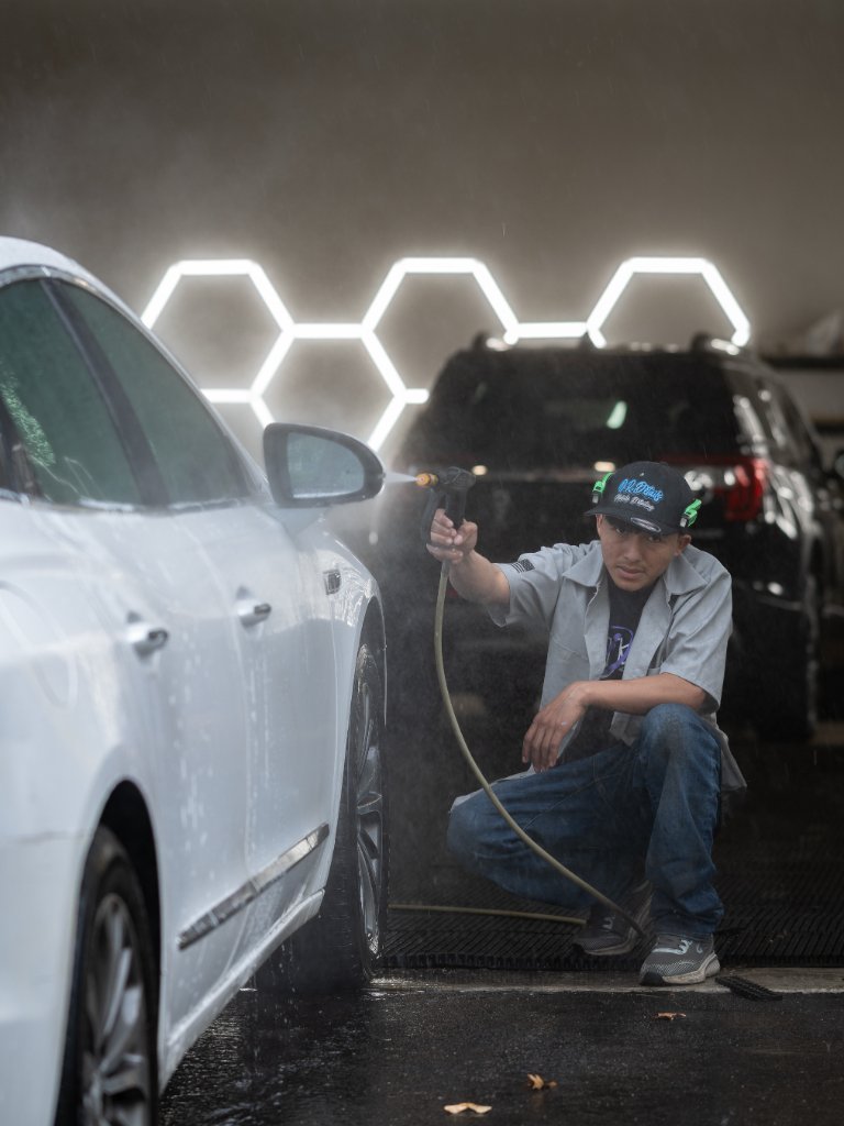 Tech washing white car with hexagon lights