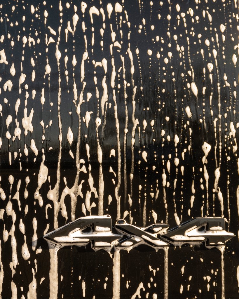 Two techs washing truck