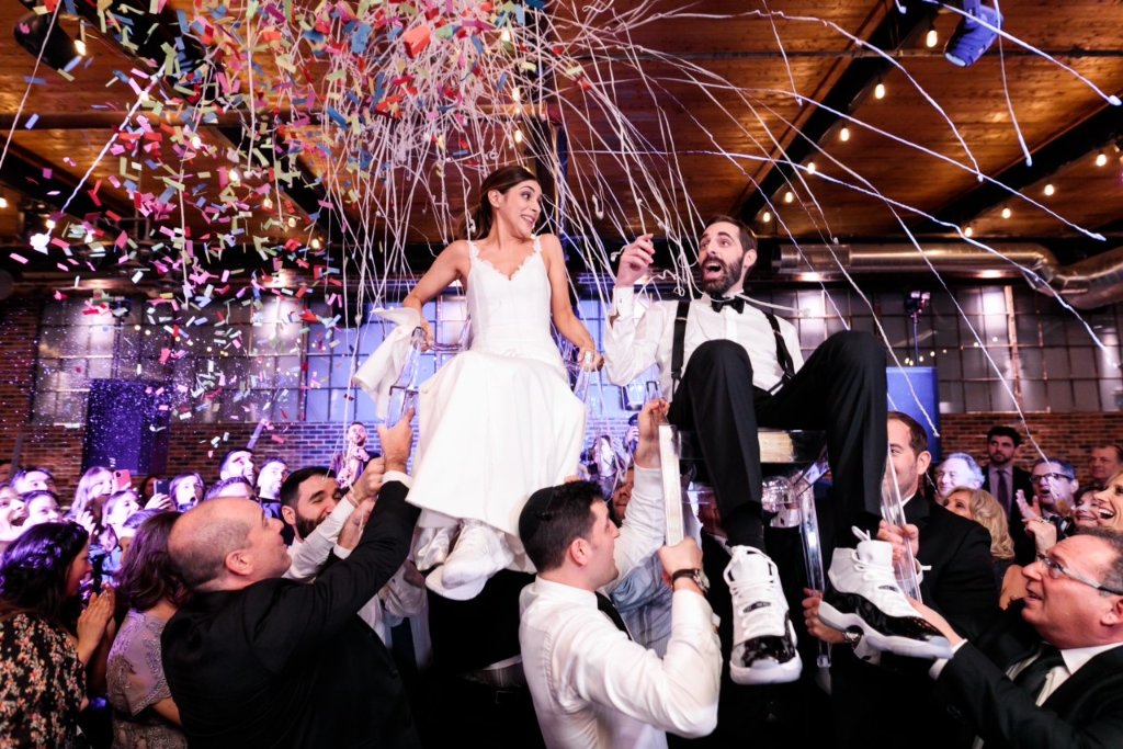 Wedding hora chair lift with confetti cannon — unforgettable Superfly moment
