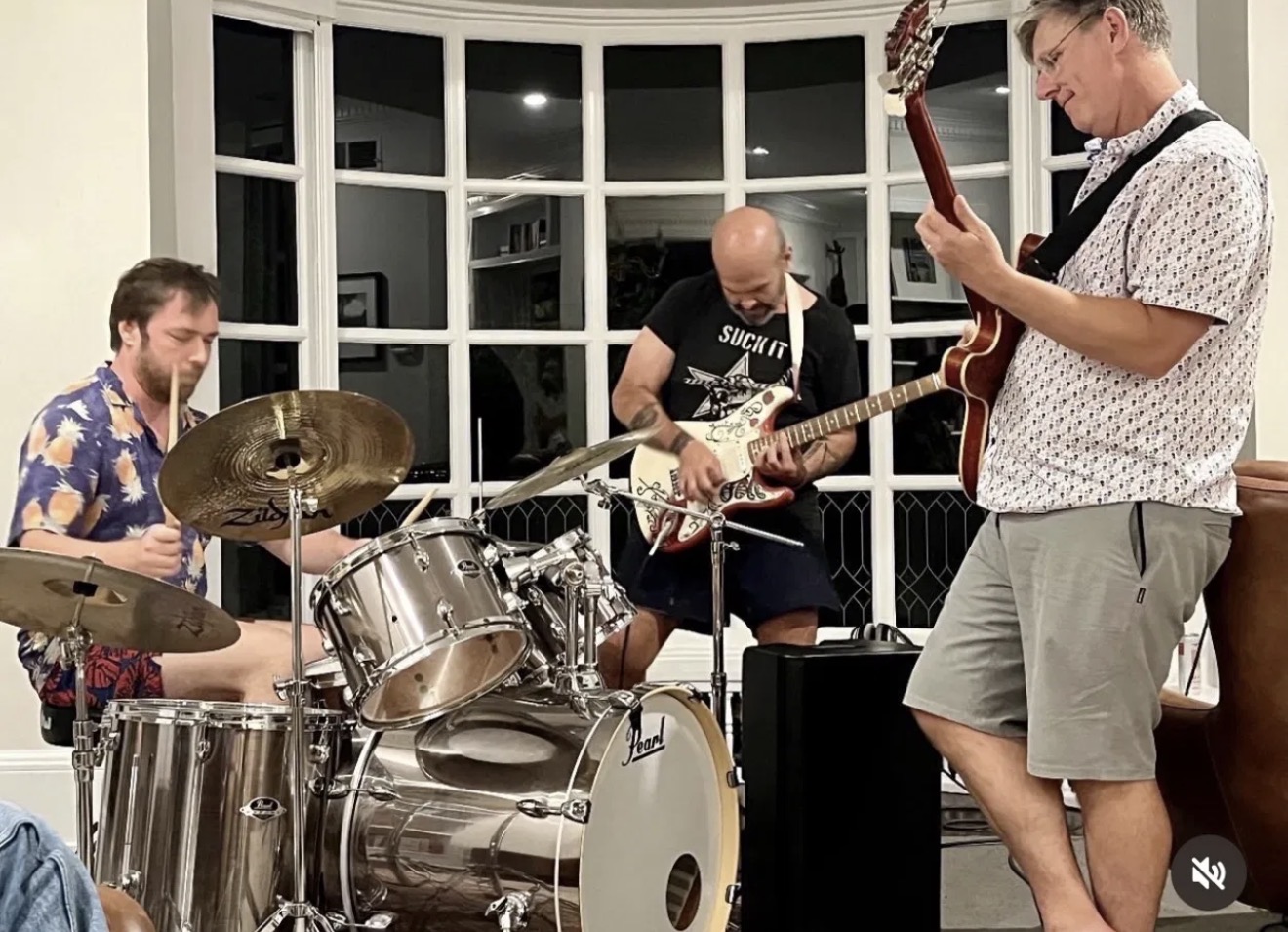 Caleb from Louise Drive and Mark King of Magnolia Electric Co. at a house show. I am on guitar. Thirty years on, the room is somebody's front room, and it still works.
