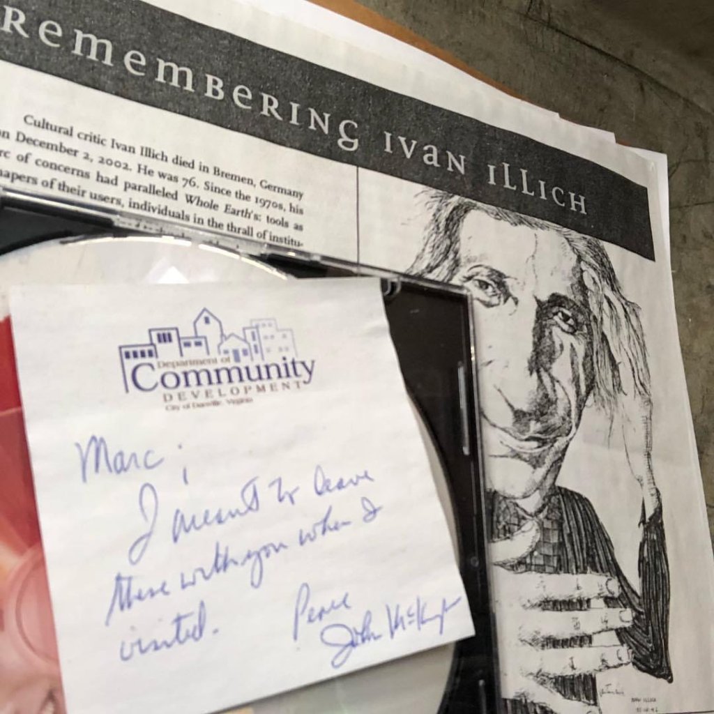 A pinned clipping, Remembering Ivan Illich, beside a handwritten note to Marc signed by John McKnight