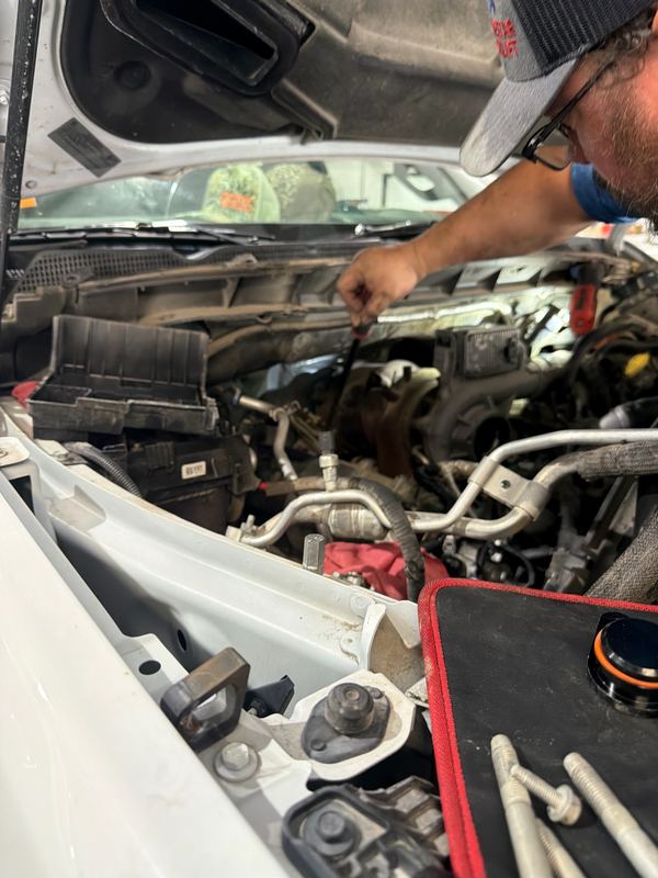 EDP technician working on a diesel engine