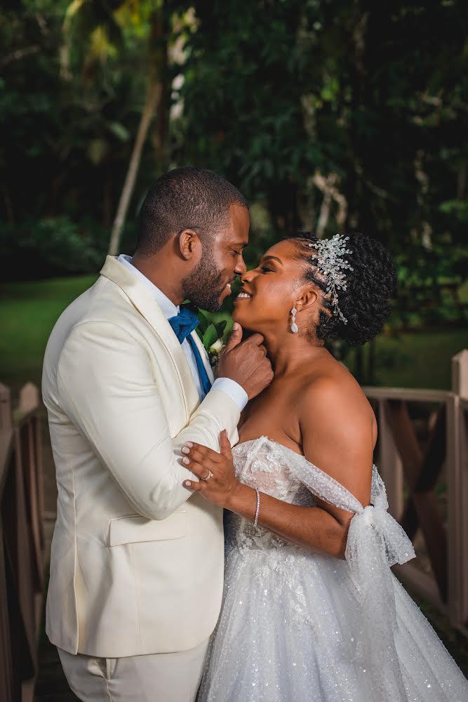 Bride and groom intimate moment at garden estate