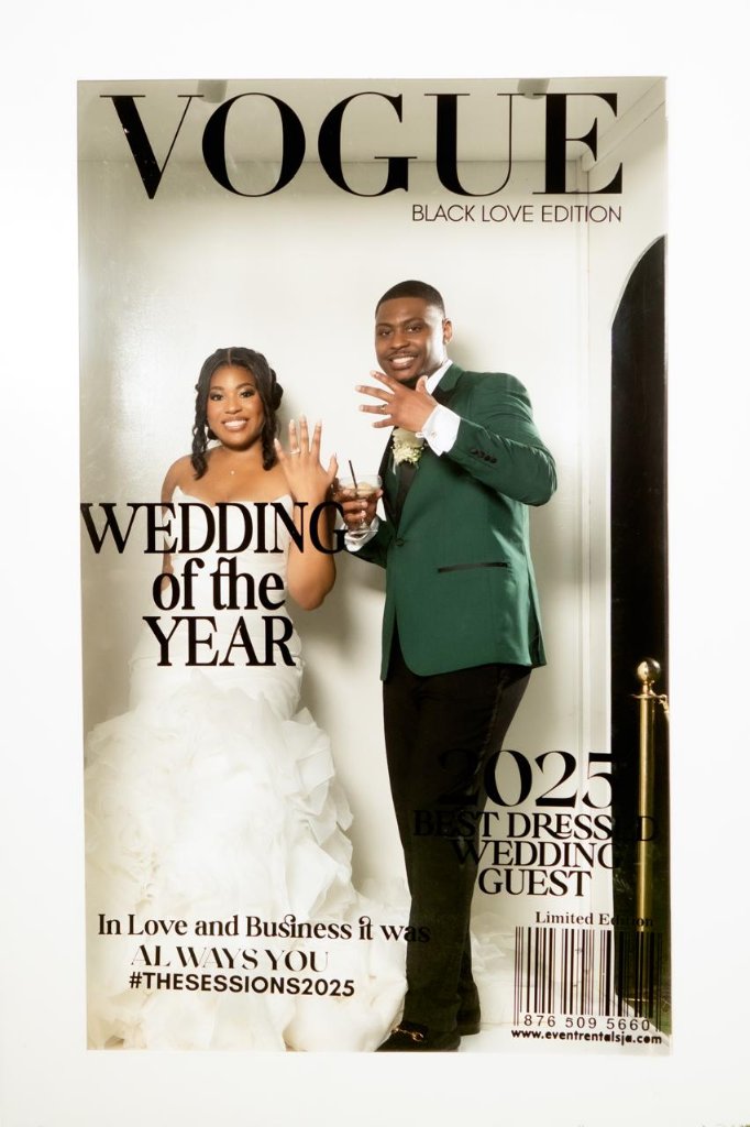 Couple posing inside Vogue Black Love Edition magazine cover prop, showing rings, #TheSessions2025