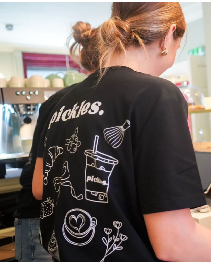 Customer wearing branded t-shirt