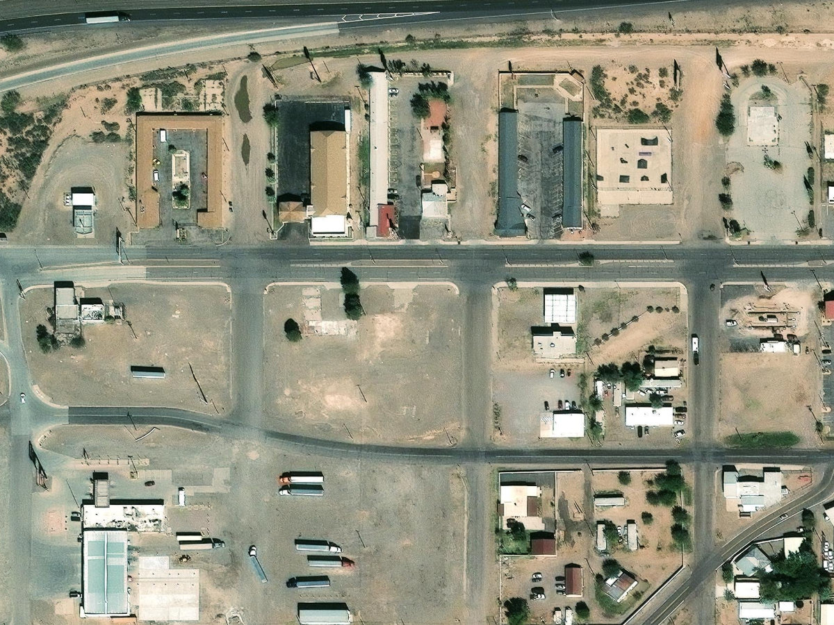 Clean aerial view of the SPS Deming W Pine Truck Parking parking area
