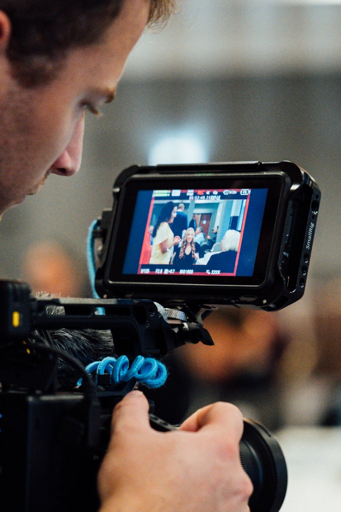 McCoy Visuals production team capturing cinematic footage for a corporate client campaign