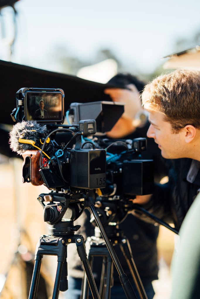 McCoy Visuals production team capturing cinematic footage for a corporate client campaign