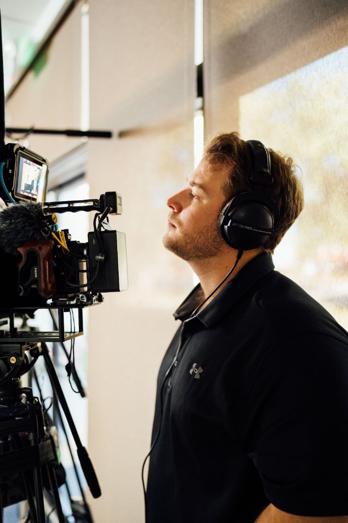 McCoy Visuals production team managing audio and video equipment on a live shoot