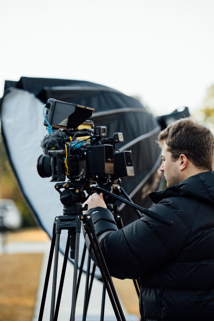 McCoy Visuals production team managing audio and video equipment on a live shoot